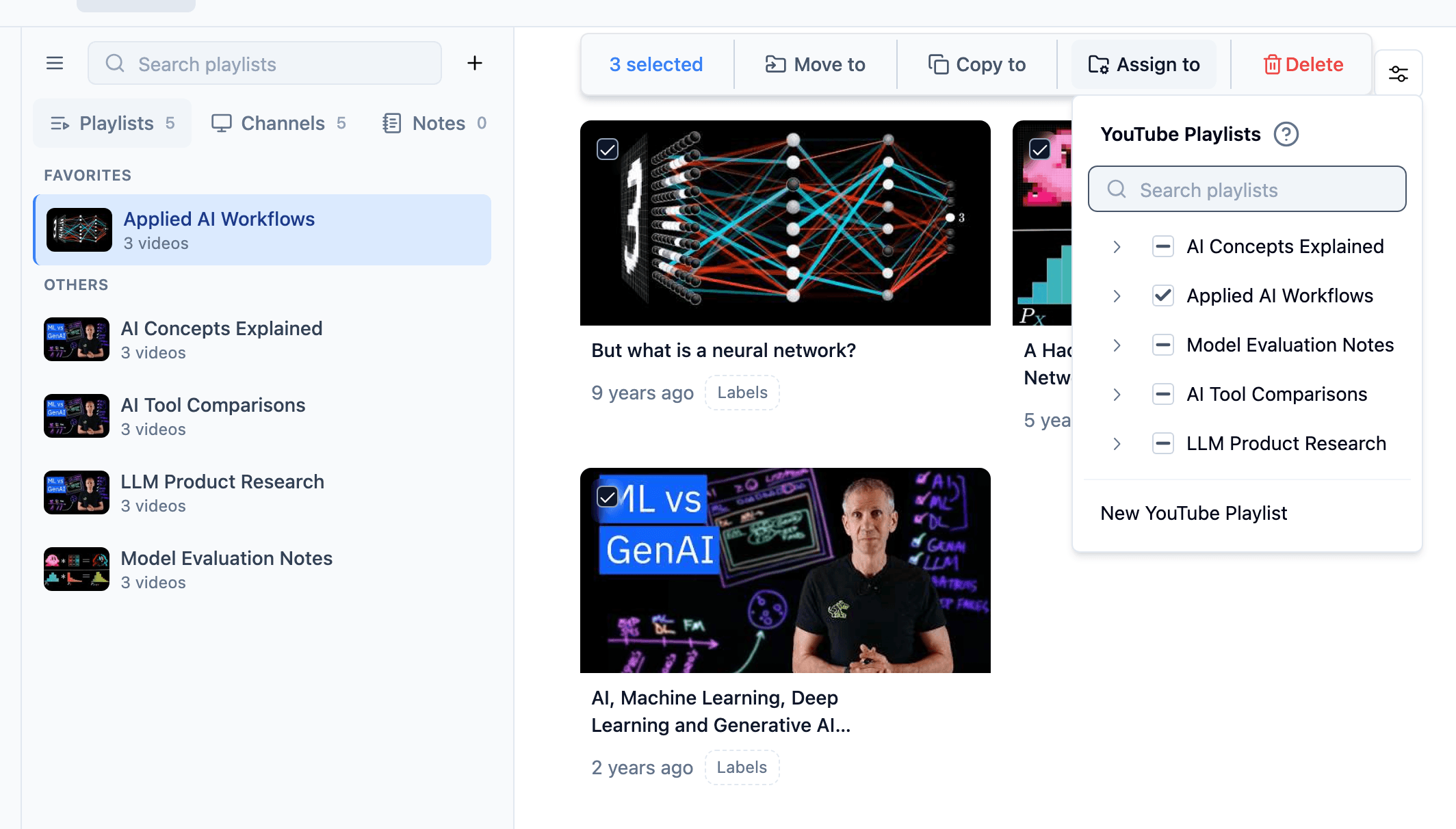 TubeFlow videos view with selected saved videos and the bulk assign to playlists menu open